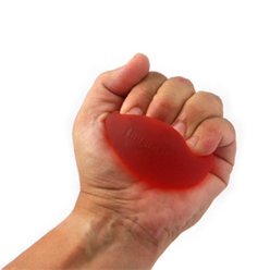En hånd der klemmer en rød håndtræningsbold